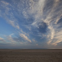 Buy canvas prints of  clouds rising over the beach by Stephen Prosser
