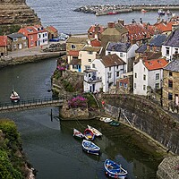 Buy canvas prints of Staithes Village Yorkshire Coast by Martyn Arnold