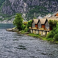 Buy canvas prints of Riverside Houses at Eidfjord Norway by Martyn Arnold