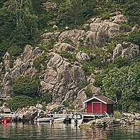 Buy canvas prints of Lysefjord Boathouse Norway by Martyn Arnold