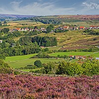 Buy canvas prints of Castleton Village in Heather, Yorkshire Moors by Martyn Arnold