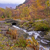 Buy canvas prints of Autumn at Ashness Bridge Lake District by Martyn Arnold