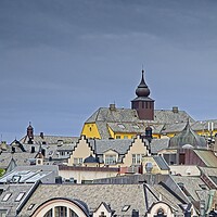 Buy canvas prints of Art Nouveau Housetops in Alesund Norway by Martyn Arnold