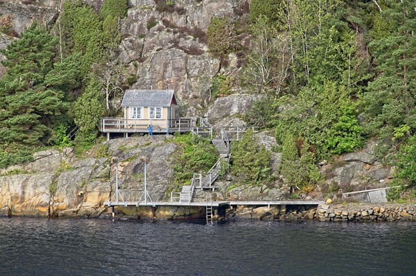 Boathouse Amongst the Rocks - Sweden Picture Board by Martyn Arnold