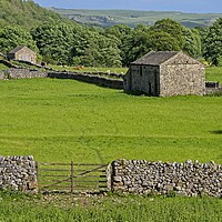 Buy canvas prints of Grassington Stone Barns - Yorkshire Dales by Martyn Arnold
