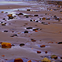 Buy canvas prints of Rocks on the Seashore by Martyn Arnold