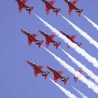 Buy canvas prints of  The RAF Red Arrows in Formation by Martyn Arnold
