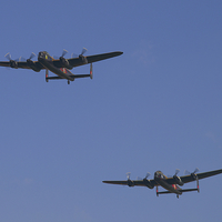 Buy canvas prints of  Lancaster Flypast - East Kirkby by Martyn Arnold