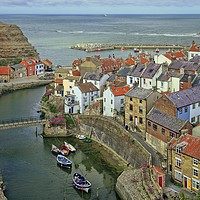 Buy canvas prints of Staithes, North Yorkshire Village Seascape by Martyn Arnold