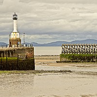Buy canvas prints of Maryport Lighthouse and Harbour, Cumbria by Martyn Arnold