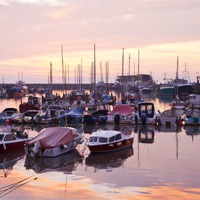 Buy canvas prints of Sunrise at Bridlington Harbour by Paula Connelly