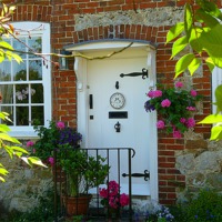 Buy canvas prints of Kentish Cottage by Antoinette B