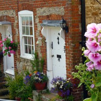 Buy canvas prints of Kentish Cottages by Antoinette B