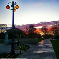 Buy canvas prints of Hythe War Memorial at sunset after the rain  by Antoinette B