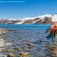 Buy canvas prints of Prayer Flags at Yamdrok Lake, Tibet by colin chalkley