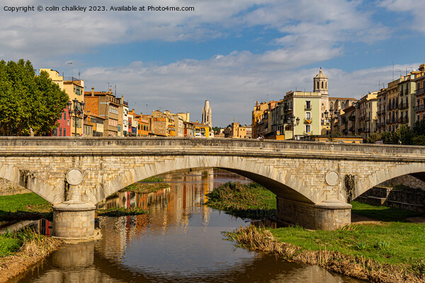Serene Reflections: The Majestic Bridge of Girona Picture Board by colin chalkley