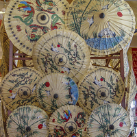 Buy canvas prints of Thai Painted Paper Parasols by colin chalkley