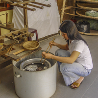 Buy canvas prints of Making silk in Thailand by colin chalkley