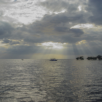 Buy canvas prints of Storm Clouds Over Tonle Sap Lake by colin chalkley