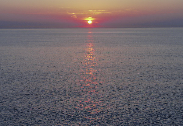 Sunrise over the North Atlantic Picture Board by colin chalkley