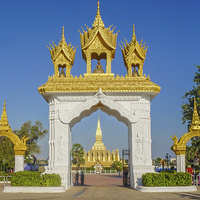 Buy canvas prints of Pha That Luang - Main gate by colin chalkley