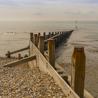 Buy canvas prints of West Wittering Breakwater by colin chalkley