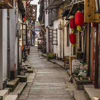 Buy canvas prints of  Lijiang Sidestreet China by colin chalkley