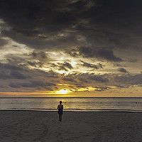 Buy canvas prints of Walking On The Beach At Sunset by colin chalkley