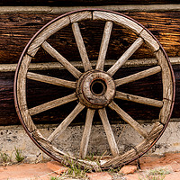 Buy canvas prints of Old Wagon Wheel - Cody, Wyoming by colin chalkley