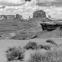 Buy canvas prints of A Lone Horseman in Monument Valley by colin chalkley