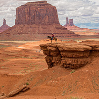 Buy canvas prints of  Monument Valley - Lone Horseman by colin chalkley