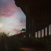 Buy canvas prints of Sunset under the M4 motorway by Leighton Collins