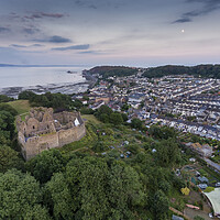 Buy canvas prints of Oystermouth Castle and Mumbles village by Leighton Collins