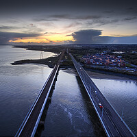 Buy canvas prints of Loughor estuary road and rail bridges by Leighton Collins