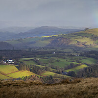 Buy canvas prints of Welsh hills and a rainbow by Leighton Collins
