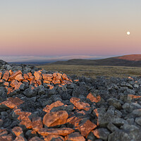 Buy canvas prints of Stone Cairn on a Mountain by Leighton Collins