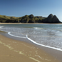 Buy canvas prints of Dramatic Three Cliffs Bay by Leighton Collins