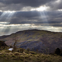 Buy canvas prints of Shafts of light on Cribarth by Leighton Collins