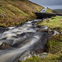Buy canvas prints of The Afon Clydach and A4069 by Leighton Collins