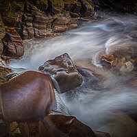 Buy canvas prints of Smooth rocks and running water by Leighton Collins