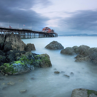 Buy canvas prints of Mumbles pier and lifeboat station by Leighton Collins
