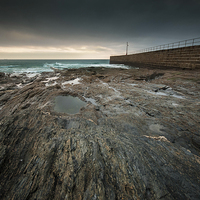 Buy canvas prints of Porthleven pier Cornwall by Leighton Collins