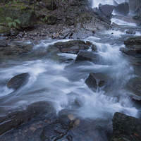 Buy canvas prints of Rushing water by Leighton Collins
