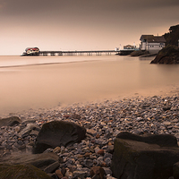 Buy canvas prints of Mumbles pier and lifeboat station by Leighton Collins
