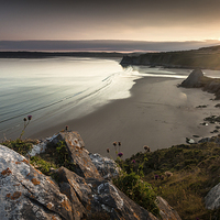 Buy canvas prints of  Sunset at Three Cliffs Bay Swansea by Leighton Collins