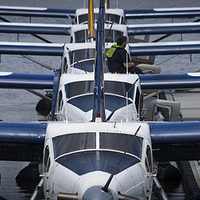 Buy canvas prints of  Seaplanes in a row by Leighton Collins