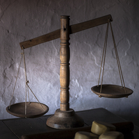 Buy canvas prints of balance scales by Leighton Collins