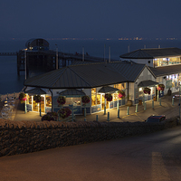 Buy canvas prints of  Mumbles Pier cafe by Leighton Collins
