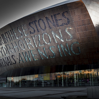 Buy canvas prints of  Wales Millennium Centre AKA Cardiff bay golden ar by Leighton Collins