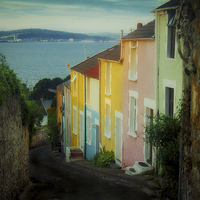Buy canvas prints of  Fishermen's cottages in Mumbles Swansea by Leighton Collins